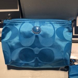 Coach cosmetic bag. New with tags. Blue